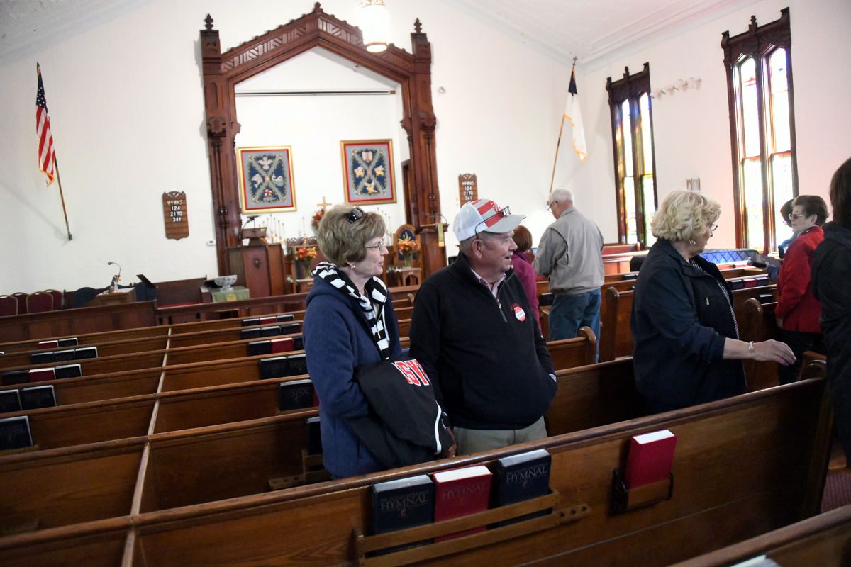 214 Mary Jane and Gary Meradith and other Fun Club travelers explored the 1878 church..jpg